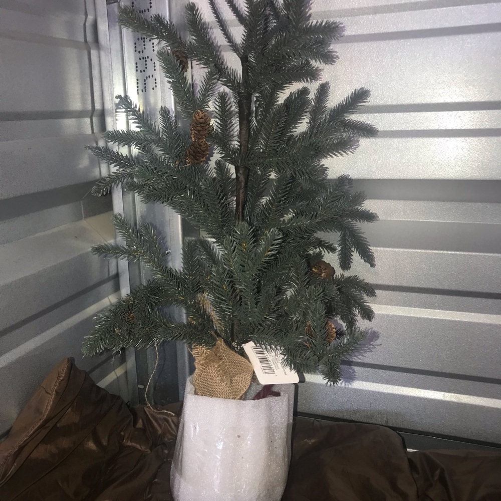 Brand new miniature faux Christmas trees for decorating